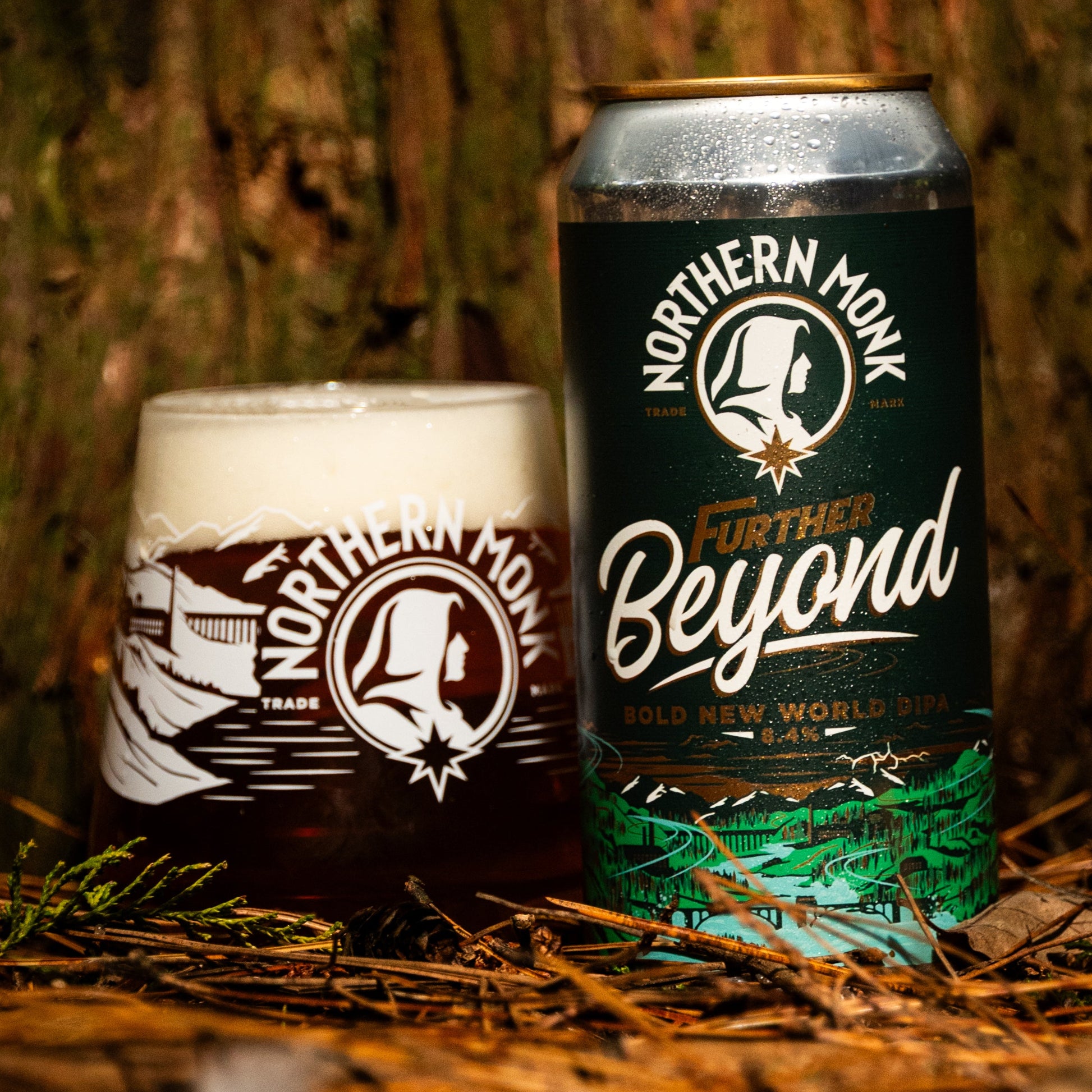 Northern Monk beer can and glass full of Further Beyond IPA on a natural background